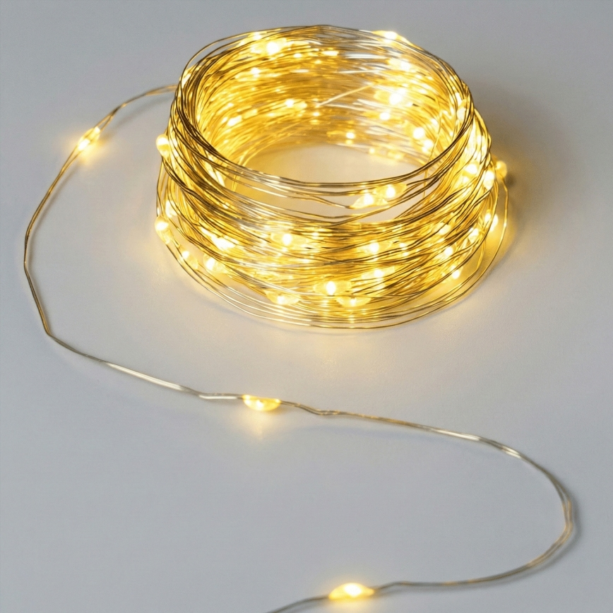 Aigostar - Ghirlandă LED pentru exterior, 50 LED-uri, 8 moduri, alimentare 3x AA, 5,3 m, alb cald