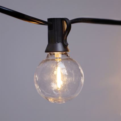 Brilagi - Ghirlandă LED decorativă pentru exterior GIRLANDA 25xE12/0,6W/230V 20m neagră IP44 alb cald + telecomandă