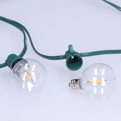 BRILAGI - LED Șir decorativ de exterior GIRLANDA 25xE12/0,8W/230V 20m verde IP44 alb cald