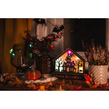 Decorațiune LED HALLOWEEN LED/2xAA/multicolor casă bântuită