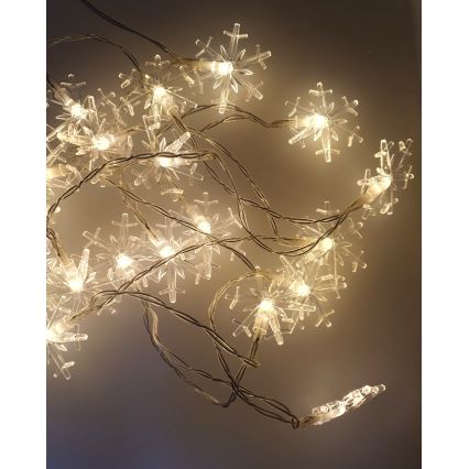 Ghirlandă LED pentru exterior 20xLED/2xAA, 2,2 m, IP44, alb cald, fulgi de zăpadă