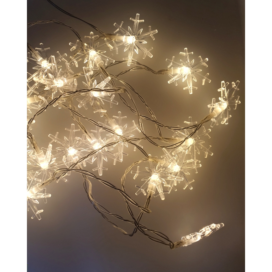 Ghirlandă LED pentru exterior 20xLED/2xAA, 2,2 m, IP44, alb cald, fulgi de zăpadă