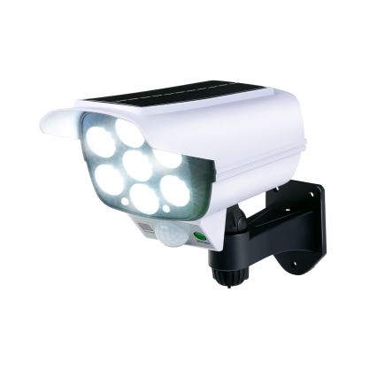 Grundig - Machetă de cameră de supraveghere solară cu LED și senzor, 1,2 V 800 mAh + telecomandă