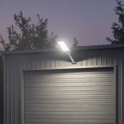 Lampă stradală solară LED reglabilă cu senzor VENICE LED/100W/3,2V 6000 mAh IP65, neagră + telecomandă