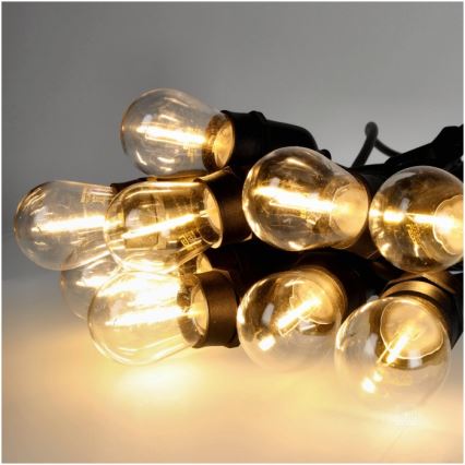 Lanț LED decorativ de exterior BAJA ST64 15xE27/1W/230V 15,9m IP44 alb cald