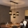 Lustră LED suspendată pe cablu BOGART 3xE27/15W/230V negru/auriu
