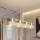 Lustră suspendată pe cablu LUX, 4x E27, 15W, 230V, alb/auriu