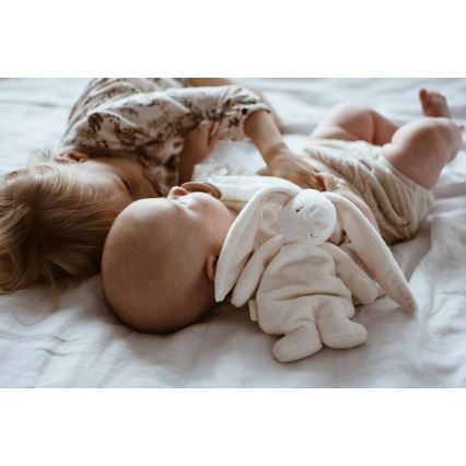 Moonie - Iepuraș de somn cu melodie și lumină, crem