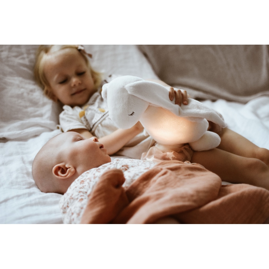 Pluș de îmbrățișat cu sunete și lumină Moonie iepuraș 2.0 cream