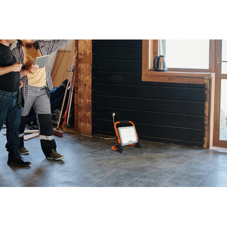 Proiector LED cu stativ, 100W, 230V, 4500K, IP65, portocaliu