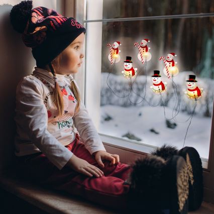 Ghirlandă LED cu ventuze 6xLED/2xAA 1,2m alb cald om de zăpadă